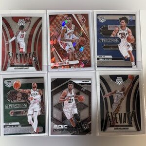 Lot of 6 basketball cards.
